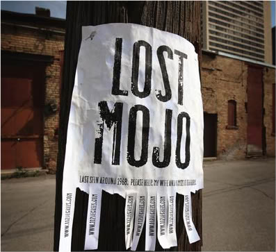Poster affixed to telegraph pole: "lost mojo"